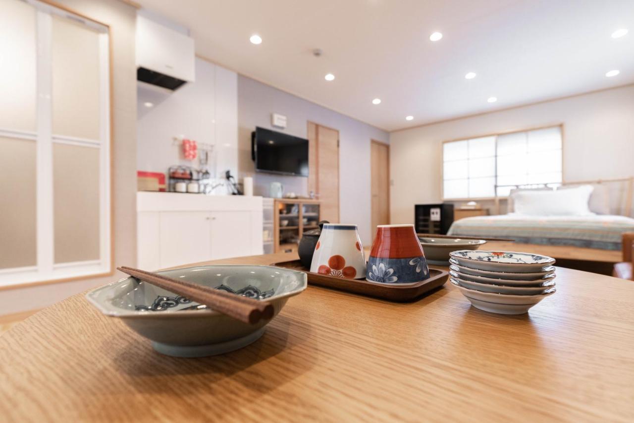 大阪道顿堀 铁甲猫の家 Apartment ภายนอก รูปภาพ